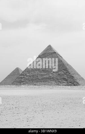 The Majestic Pyramids of Giza Stand Tall Against a Dramatic, Cloudy Sky ...