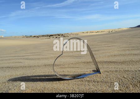 Conceptual an Heart Love Object in the Dry Desert Stock Photo