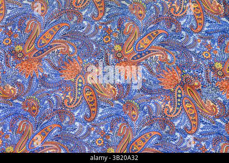 Floral paisley seamless ornament colorful blue orange red texture pattern diagonal composition texile Stock Photo