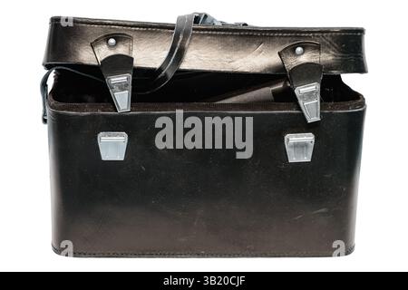An old worn black leather briefcase opened with latches isolated on white background Stock Photo