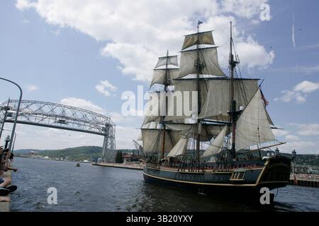 2010 JUL 29:  The 180-foot HMS Bounty sails into port in Duluth Harbor in Duluth, MN. with the Duluth Aerial Lift Bridge in the background for the Tall Ships Duluth 2010 festival and race, part of Tall Ships tour of the Great Lakes.  The HMS Bounty has appeared in numerous Hollywood movies including 2 of the ''Pirates of the Caribbean'' movies, ''Mutiny on the Bounty'' starring Marlon Brando, ''Treasure Island'' starring Charlton Heston'' and has appeared in over 100 sailing documentaries.   An estimated  crowd of 200,000 people attended the 4 day event.(Credit Image: © Josh Holmberg/Cal Sport Stock Photo
