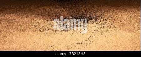 Copper foil background with a polished, golden texture. Shimmering, grunge effect with a rich, sleek finish. Wide, horizontal banner design, perfect f Stock Photo
