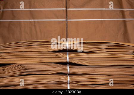 Folded stacks of paper bags, close-up. Stock Photo