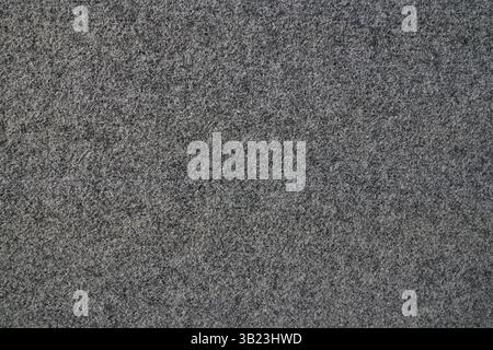 Soft grey felt material. The surface is made of felt fabric with a gray abstract background texture. With space to copy. High quality photo Stock Photo