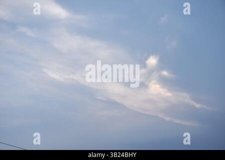 white and dark rain cloud floating on sky in evening Stock Photo