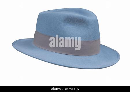 Classic light blue fedora hat isolated on white. A trendy, elegant, unisex headwear. Old fashioned stylish hat. Stylish felt hat close up. Nobody, sel Stock Photo