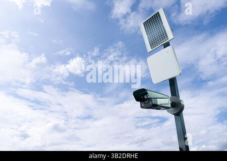 CCTV Surveillance camera powered by solar energy. Stock Photo