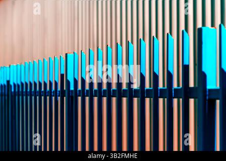 Blue metallic fence striped pattern as background Stock Photo