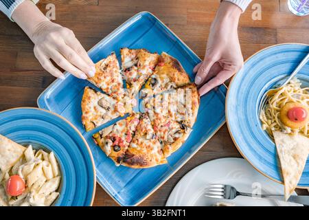Belgian waffle with fruits on plate, top view, isolated on white background with clipping path Stock Photo