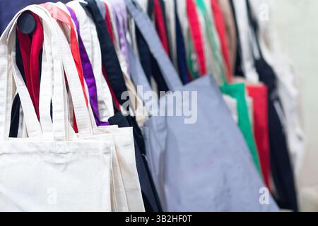 A row of colorful environmentally friendly shopping bags. Shopping Stock Photo