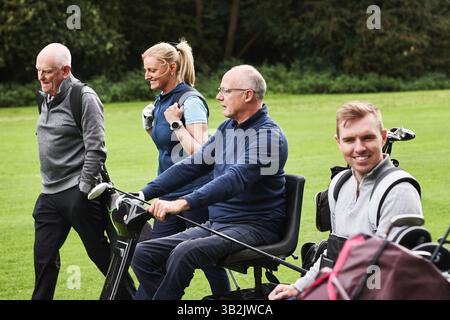 Sports, mobility scooter and happy people for golf game, match and competition on golfing course. Recreation, friends and women and senior person with Stock Photo