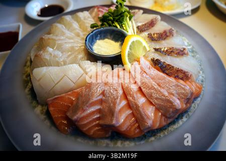Exquisite Sashimi Platter with Fresh Salmon and Seafood Presentation Stock Photo