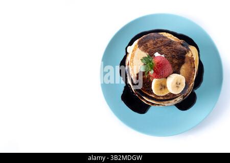 Pancakes with chocolate and fruit isolated on white background Stock Photo