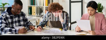 Studying Foreign Languages in Collaborative Classroom Setting Stock Photo