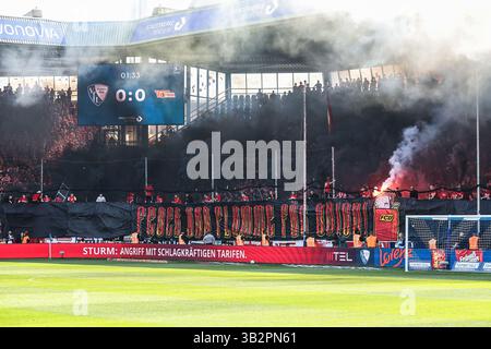 1. Bundesliga - VfL Bochum - 1. FC Union Berlin am 27.04.2025 im Vonovia Ruhrstadion in Bochum Die Fans von Union Berlin im Gästeblock mit einem Banner / Spruchband / Transparent Feuer und Flamme für Union und einer Pyroshow Foto: osnapix DFL regulations prohibit any use of photographs as image sequences and/or quasi-video Stock Photo