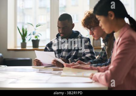Students Studying Languages in Classroom Environment Stock Photo