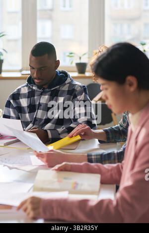 Students Studying Foreign Languages in Classroom Environment Stock Photo