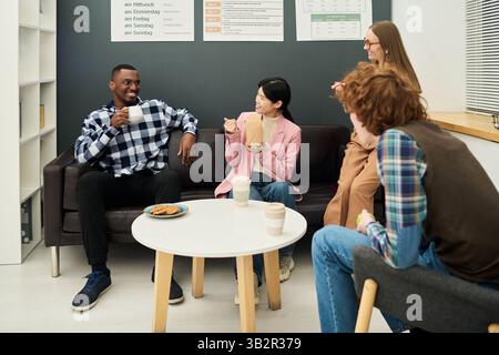 Group of People Engaging in Foreign Language Study Session Stock Photo