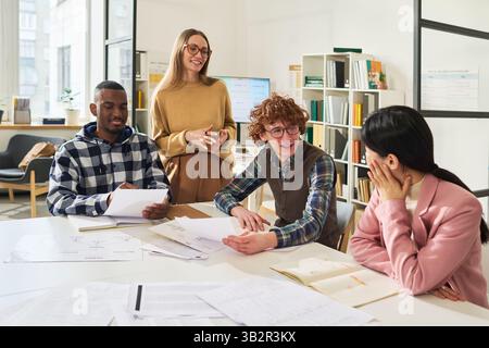 Studying Foreign Languages in Classroom Setting Stock Photo
