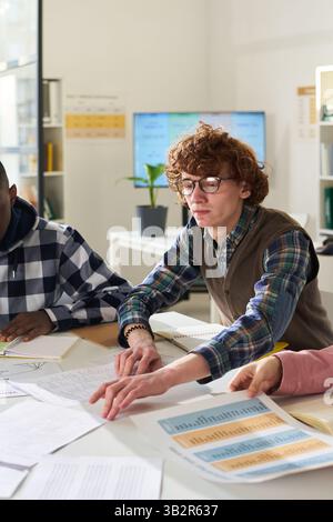 Collaborating and Studying Foreign Languages in Classroom Stock Photo