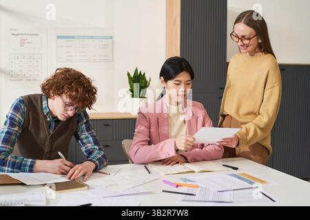Studying Foreign Languages in Modern Classroom Setting Stock Photo