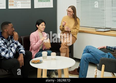 Smiling Students Studying Foreign Languages in Classroom Stock Photo