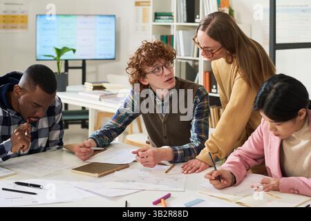 Studying Foreign Languages in Diverse Classroom Setting Stock Photo