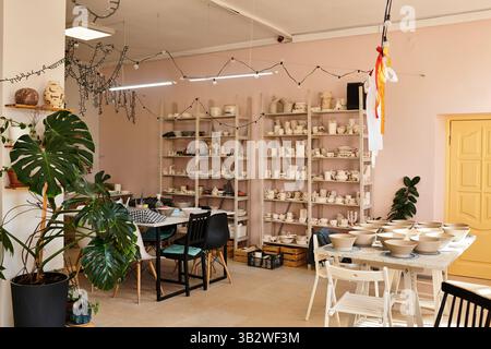 Colorful well lit studio to craft and create artistic ceramic pieces. Stock Photo