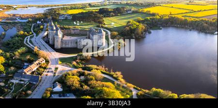Most beautiful medieval french castles - amazing chateau de Suscinio (Susinio) over sunset in Brittany. aerial high angle panoramic view Stock Photo