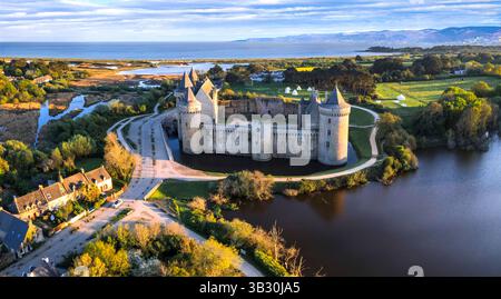Most beautiful medieval french castles - amazing chateau de Suscinio (Susinio) over sunset in Brittany. aerial high angle panoramic view Stock Photo