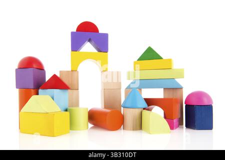 Village built from colorful toy blocks isolated over white background Stock Photo