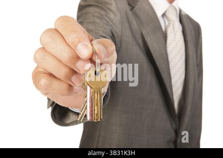 House broker is giving the keys Stock Photo