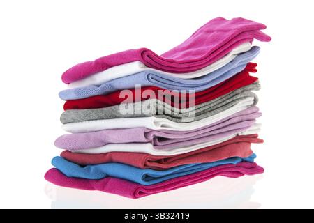 Stacked colorful socks isolated over white background Stock Photo