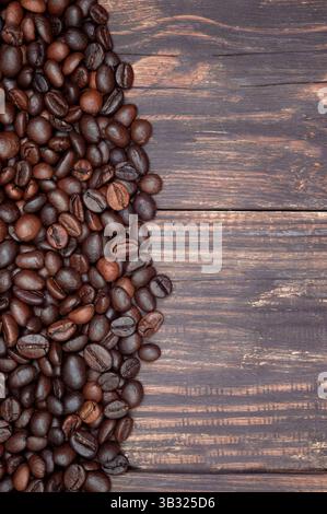 coffee beans on a dark background, top view, copyspace. coffee background. close-up. Stock Photo