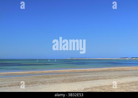 Ile de Rée- Beach landscape sand and sea with sailboats at the horizon ...
