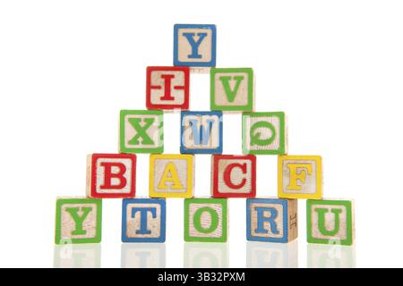 Colorful educational wooden toy blocks with alphabet Stock Photo