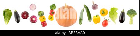 Falling colorful vegetables and fruits with light reflection isolated on white background. Stock Photo