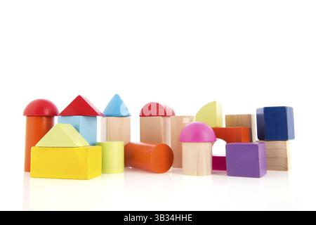 Village built from colorful toy blocks isolated over white background Stock Photo