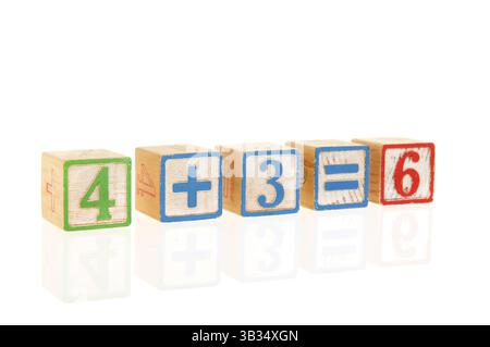 Colorful educational wooden toy blocks with sum Stock Photo