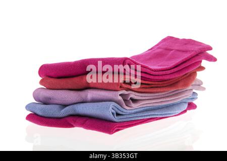 Pink and blue socks isolated over white background Stock Photo