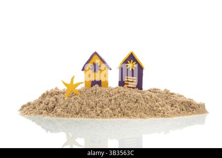 Island with colorful handmade beach cabins isolated over white background Stock Photo