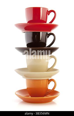 Colorful cups and saucers isolated over white background Stock Photo