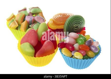 Four colorful cups full with assortment candy Stock Photo