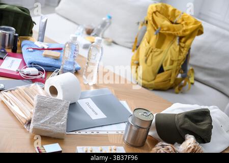 Survival kit. Different emergency supplies on wooden table indoors Stock Photo