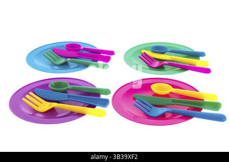 Colorful plastic crockery isolated white background Stock Photo