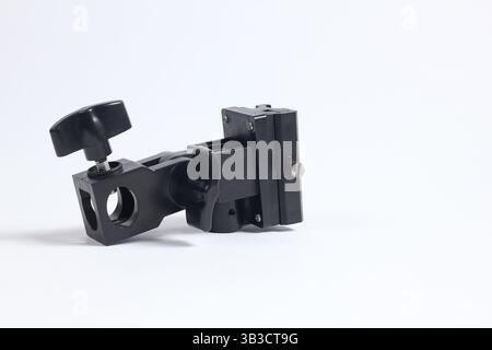 flash holder tripod mount for external flash and white umbrella for studio shooting Stock Photo