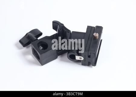 flash holder tripod mount for external flash and white umbrella for studio shooting Stock Photo