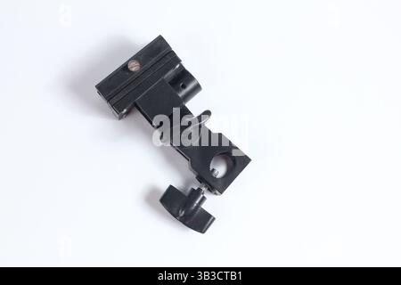 flash holder tripod mount for external flash and white umbrella for studio shooting Stock Photo