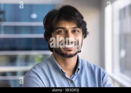 Head shot portrait of happy Indian businessman Stock Photo