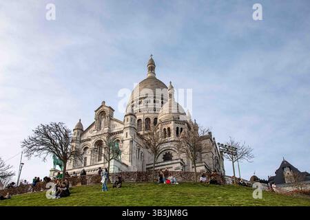 Low-angle view of Basilique du Sacré-Cœur de Montmartre against sky in Montmartre district of Paris, France Stock Photo
